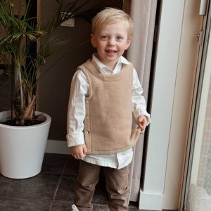 Merino wollen bodywarmer met drukknopen