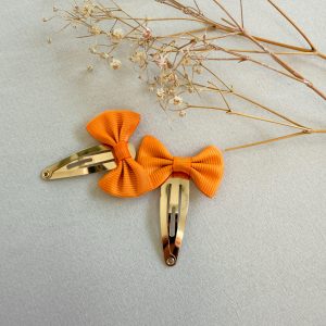 Knipjes oranje strikje